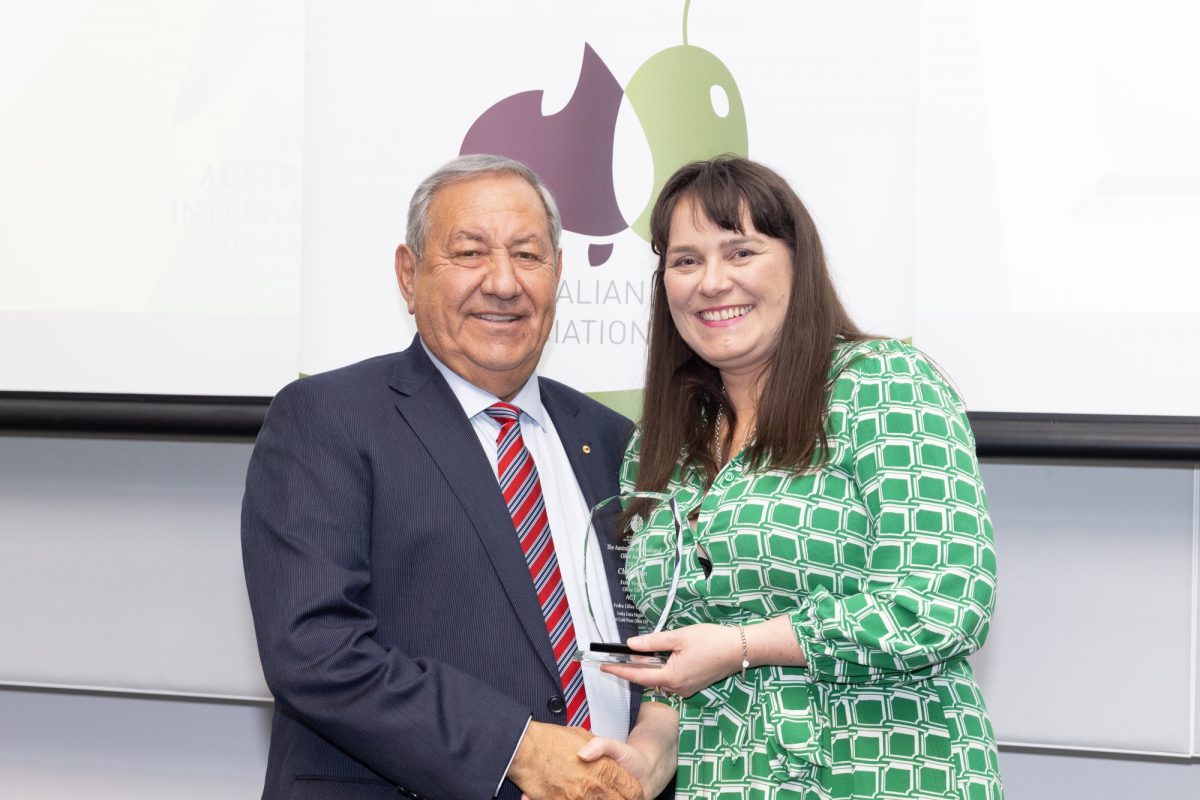 Jeff receiving Gold for Fedra extra virgin olive oil at the Australian international olive oil awards night 2024. 